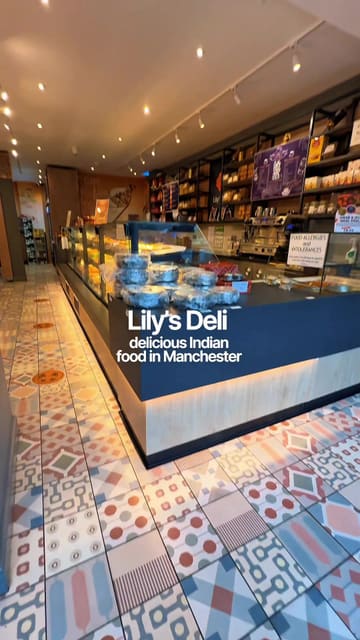 A short, engaging montage showcasing Lily's Deli in Manchester, highlighting their vegetarian Indian street food, curries, samosas, and the shop section selling traditional snacks and ingredients.