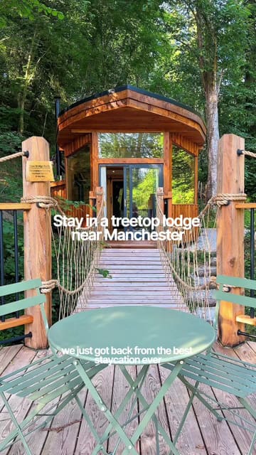 A vlog-style tour of a treetop lodge staycation near Manchester, highlighting the relaxing atmosphere, pizza oven, and balcony.