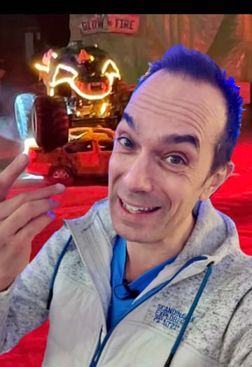 A high-energy vlog featuring a visit to the Hot Wheels Monster Trucks Live event at the O2 Arena in London. The creator shares their excitement, shows clips of the monster trucks performing stunts, and mentions upcoming tour dates.