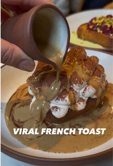 A short, engaging review of the viral French toast at Mallow, London Bridge. The video features close-up shots of the food being prepared and eaten, along with the creator's positive reaction, highlighting both the tiramisu and pistachio/cherry variations.
