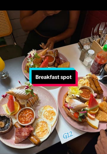 A casual, vlog-style review of a breakfast/brunch visit to Beans & Bites, featuring banter between two friends, menu recommendations like the Oreo and pistachio French toast, and a relaxed, post-bank-holiday vibe.
