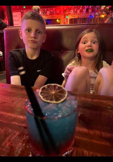 A family-focused vlog documenting a 10th birthday celebration at Buck's Bar. The video features the group enjoying a variety of dishes including chicken waffles, salt and chilli fries, and cocktails, highlighting the venue's suitability for both families and adults.