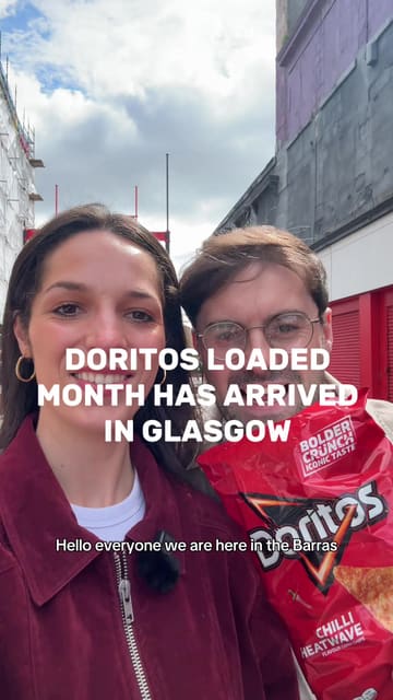 A promotional video for 'Doritos Loaded Month' where creators visit a street food vendor in Glasgow to get a bag of Doritos loaded with toppings for £5.