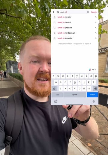 A creator participates in the 'lunch in my city' trend in Bristol, using TikTok to find a record shop and taqueria called Alta Loma. He walks to the venue, orders tacos, fries, and a jalapeno lemonade, and provides a review of the food and atmosphere.