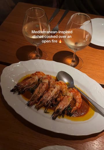 A visually appealing montage showcasing a dinner experience at Firebird in Soho, highlighting the open-fire cooking, cocktails, and various Mediterranean-inspired dishes.