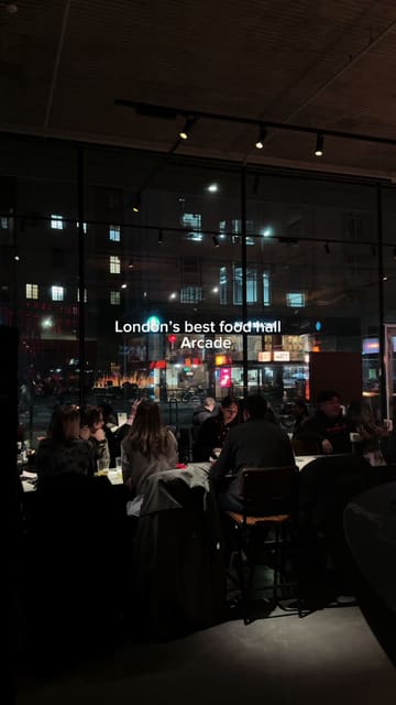 A quick-cut montage showcasing various dishes from different kitchens at Arcade Food Hall in London, including burgers, ramen, and Thai curries.