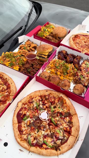 A high-energy, fast-paced review of a 'munchbox' takeaway deal from Chickfellas, highlighting the variety and value for money of the food. The creator showcases multiple items including burgers, pizza, and sides, emphasizing the affordability of the meal.