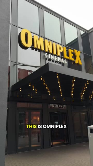 A short, engaging video tour of the Omniplex Cinema in Sunderland, highlighting the lobby, concession area, and seating. The creator provides a voiceover sharing their first-time experience, showcasing the food options like pizza and nachos, and the overall atmosphere of the venue.
