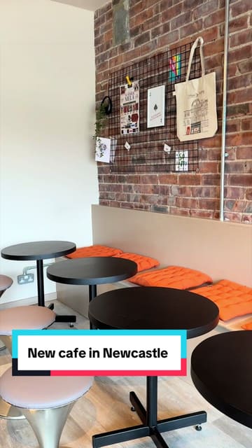 A short, fast-paced video showcasing the interior, coffee preparation, and menu items of a new cafe called Coco & Co. in Newcastle.