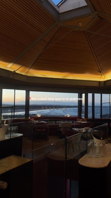 A short, atmospheric montage showcasing the interior, views, and menu offerings of Clarets in St Andrews, featuring shots of champagne, salmon canapés, and sandwiches.