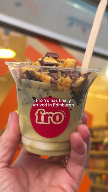 A short, energetic video showcasing a frozen yogurt pop-up in Edinburgh. The creator highlights the menu, the dispensing process, the topping options, and the shop's interior, providing a quick and appealing look at the experience.