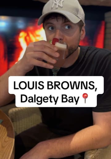 A creator visits Louie Brown's in Dalgety Bay, providing a personal review of the venue's atmosphere, menu, and specific dishes including pork belly tacos, a fish dish, and a cocktail.