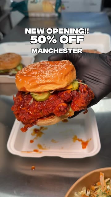 A promotional video for the reopening of 0161 Flamin Fusion in Ardwick Kitchens, Manchester. The video features the creator showcasing various menu items including burgers, loaded fries, and fried potatoes, while highlighting a 50% off opening offer.
