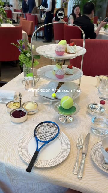 A video showcasing a Wimbledon-themed afternoon tea experience at The Peninsula Hotel in London, featuring the venue's elegant interior, the themed food presentation, and the overall atmosphere.