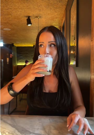 A couple visits Town Square Belfast to review their cocktails, tacos, burger, fries, and s'mores board.