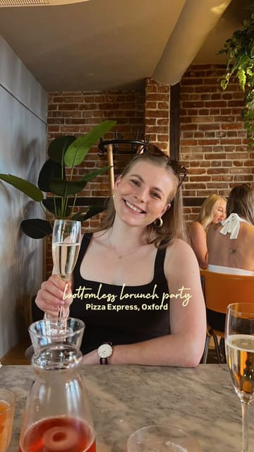 A fast-paced, energetic reel showcasing a bottomless brunch experience at a Pizza Express venue. The video features a montage of the group enjoying drinks, eating pizza and dough balls, and dancing to a live DJ, highlighting the transition from a meal to a party atmosphere.