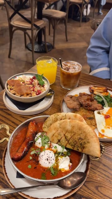 A review of a brunch spot in London called Brother Marcus, featuring various dishes like shakshuka, fried chicken rosti, and a granola bowl. The creator highlights the Eastern Mediterranean flavours and the overall quality of the food.