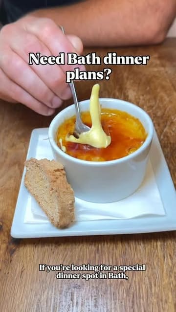 A short, engaging video showcasing a dinner experience at The Circus restaurant in Bath, featuring close-ups of various dishes including pork belly, pork tomahawk, aloo bonda, and creme brulee.