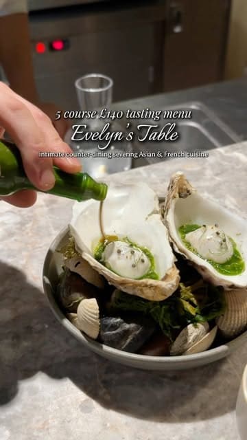 A high-quality showcase of a tasting menu at Evelyn's Table, featuring close-up shots of intricate plating, including langoustine, lobster, wagyu, and truffles.