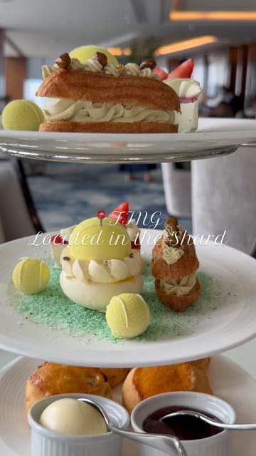 A short, aesthetic montage showcasing the tennis-themed afternoon tea service at Ting in The Shard, featuring close-ups of the desserts, a live musical performance, and a cocktail toast.