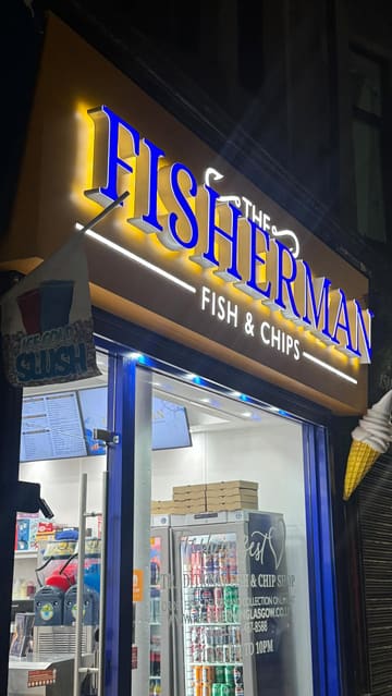 A straightforward promotional video for a new fish and chip shop, featuring shots of the exterior, menu boards, food preparation, and the final takeaway meals and desserts.