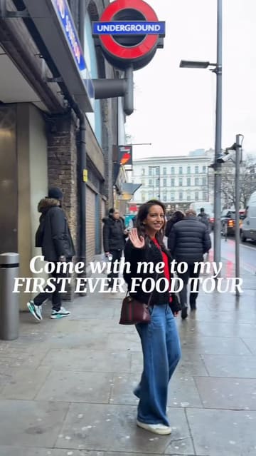 A vlog-style reel documenting a food tour around the London Bridge and Borough Market area. The creator visits several establishments, including a cafe for a breakfast bap, a fish and chip shop, a market stall for sausage rolls, and a historic pub for cheese and dessert.