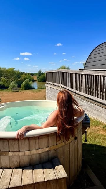 A montage showcasing a stay at Foxholes Farm, highlighting the glamping pods, private hot tub, farm animals, and family-friendly activities like the play area and sandpit.
