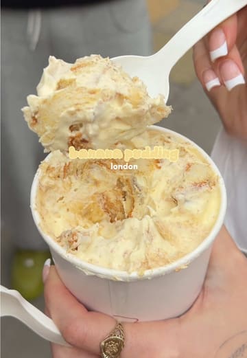 A short video showcasing the banana pudding at Vnilla in London. The clip features the exterior of the shop followed by close-up shots of the pudding being scooped into a cup and a final shot of a spoonful, emphasizing the texture and presentation of the dessert.