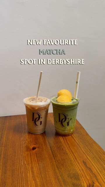 The video features a montage of menu items including matcha drinks, a toast dish, and an acai bowl at Daily Grind Coffee House, followed by shots of the cafe's interior and exterior.