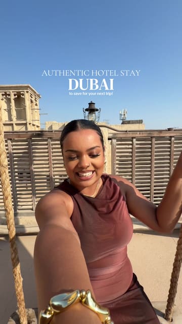 A travel vlog showcasing the Al Seef Heritage Hotel in Dubai, highlighting the authentic Emirati decor, room options, breakfast buffet, and proximity to Dubai Creek.