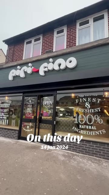 A short promotional video for Piri Fino, showcasing the restaurant's interior and a variety of dishes including peri-peri chicken, pasta, burgers, and sides. The video uses a montage style with music and text overlays to present the venue.