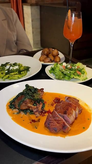A review of Lennox in Edinburgh, featuring a tour of the interior, an introduction to the menu, and close-ups of various dishes including a Scotch egg, buffalo squid, and duck.