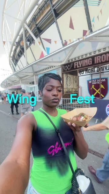 A first-person vlog capturing a visit to Wing Fest UK, featuring tastings from various chicken wing vendors and a doughnut stall, showcasing the festival atmosphere and food variety.