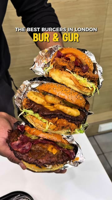 A fast-paced promotional video for a burger venue, featuring a variety of burgers, sides, and desserts. The video uses quick cuts to highlight the preparation and final presentation of the food, creating a high-energy and appetizing showcase.