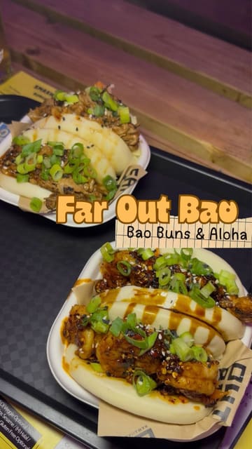 A fast-paced montage showcasing various food vendors at Dockyard Social in Glasgow, including Far Out Bao, Cafe XO, and Buck's Bar. The video features close-ups of bao buns, a Korean BBQ chicken sandwich, a burger, and cocktails, set to music with text overlays identifying the dishes.