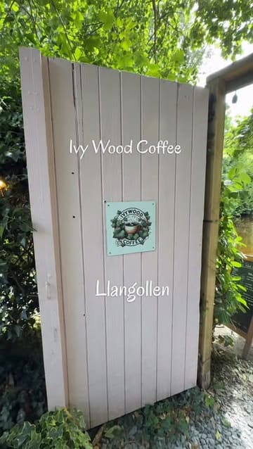 A short, casual tour of Ivy Wood Coffee in Llangollen, highlighting the outdoor, canal-side setting, the coffee, and the food selection including sausage rolls and cakes.