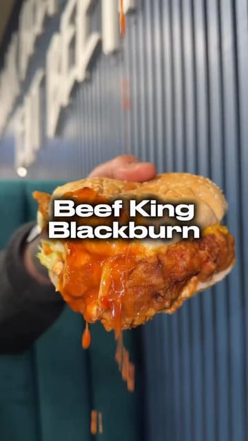 A review of Beef King in Blackburn, showcasing various menu items including chicken tenders, a rice box, a chicken wrap, a spicy chicken burger, a smash burger, and loaded fries.