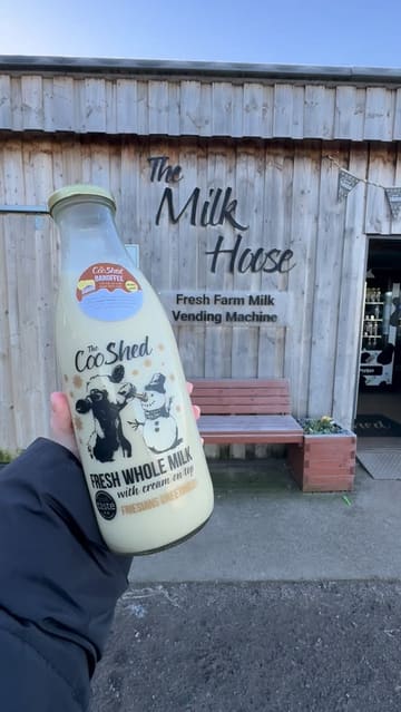 A short video showcasing a 24-hour milkshake vending machine experience at The Coo Shed, where customers can select their own milk and syrup flavors.