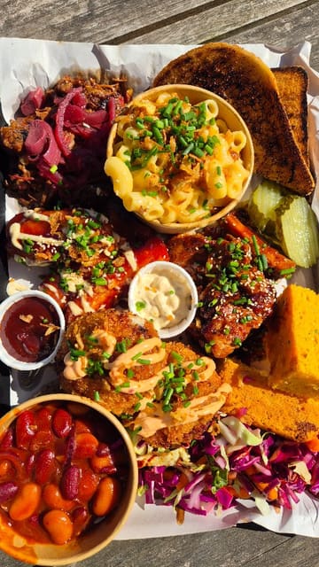 A promotional video for Fat Jack's Shack at Drapers Yard, featuring shots of the venue's exterior, menu, and a detailed look at their BBQ platter.