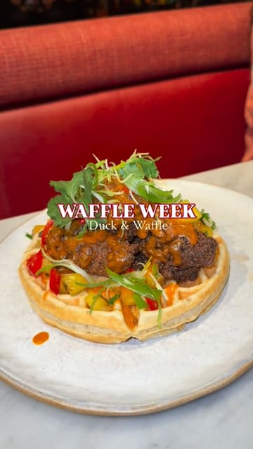 A promotional reel showcasing the 'Waffle Week' menu at Duck & Waffle, featuring various savoury and sweet waffle-based dishes and cocktails.