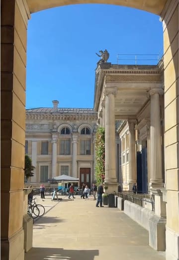 A travel-focused day-in-the-life reel showcasing a variety of spots in Oxford, including a motel, diner, coffee shop, covered market, bookstore, and shopping village.