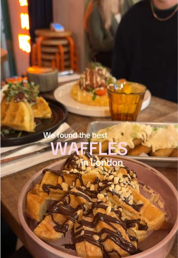 A short, fast-paced montage showcasing the menu and interior of Utter Waffle in Herne Hill, London. The video features close-ups of various waffle dishes, a quick look at the menu, the cafe's interior, and the exterior signage.