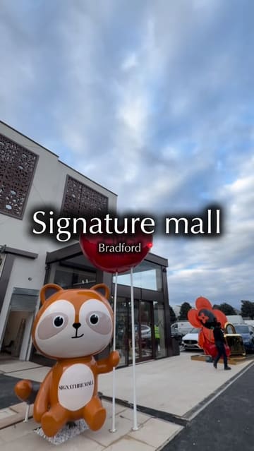 A montage-style tour of Signature Mall in Bradford, highlighting the interior design, various retail outlets, and food vendors available within the complex.