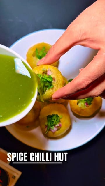 A promotional video for Spice Chilli Hut in Leeds, showcasing a variety of Indian street food, curries, and Indo-Chinese dishes.