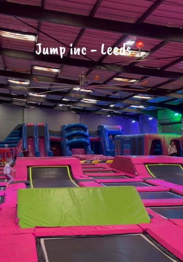 A fast-paced, energetic video showcasing the facilities at Jump Inc in Leeds, including various trampoline areas, inflatable obstacle courses, and basketball hoops.
