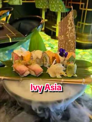 A high-quality, cinematic montage showcasing the interior, cocktails, and various dishes at The Ivy Asia. The video uses smooth transitions and atmospheric lighting to present the venue as a stylish and desirable dining destination.