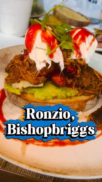 A vlog-style review of Ronzio in Bishopbriggs, featuring a tour of the interior, a look at the menu, and close-ups of brunch items like the 'Hot Hog' and various drinks.