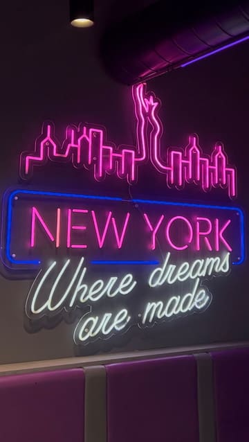 A promotional video showcasing a new menu at NYK, a fast-food venue in Bradford, featuring a variety of burgers, loaded fries, wings, tenders, and desserts.