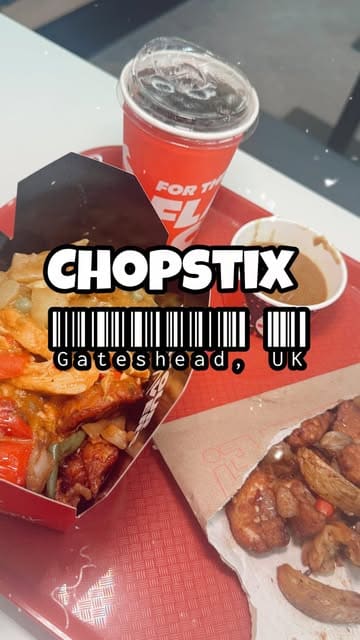 A promotional video for the opening of a new Chopstix Noodle Bar in Trinity Square, featuring shots of the interior, the food counter, and various menu items like noodles, chicken, dumplings, and bao.