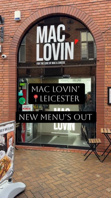 A promotional video for Mac Lovin' in Leicester, showcasing their new menu items, including crispy chicken and BBQ jerk pulled chicken mac and cheese. The video features quick, handheld shots of the food being presented in branded takeaway boxes, emphasizing the texture and toppings.